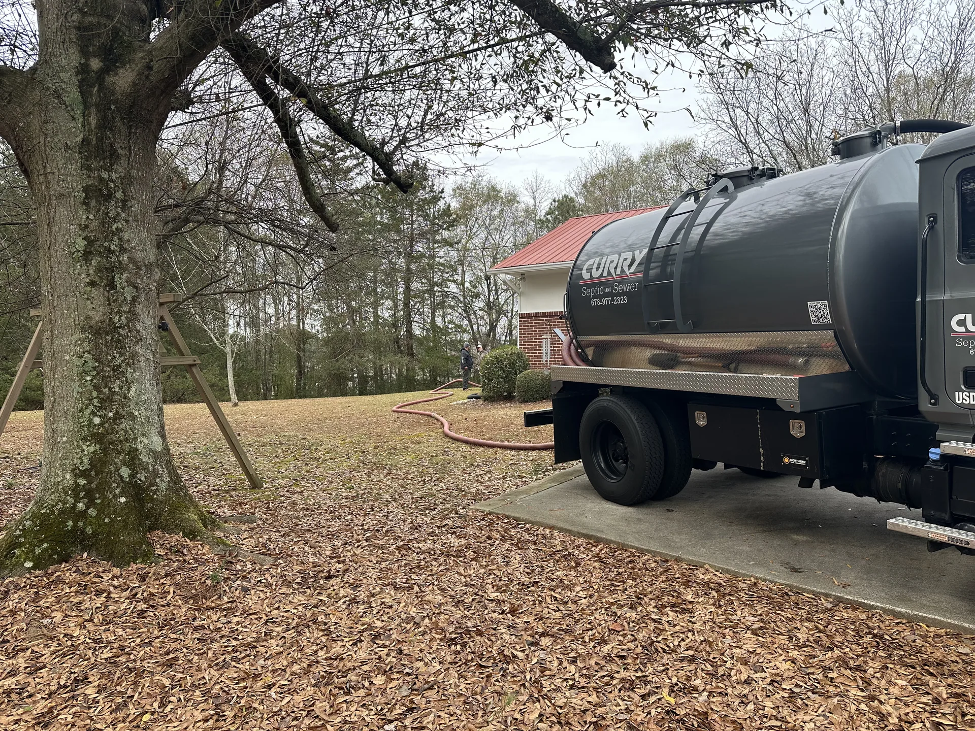 Curry Septic and Sewer crew at work in Hoschton, GA