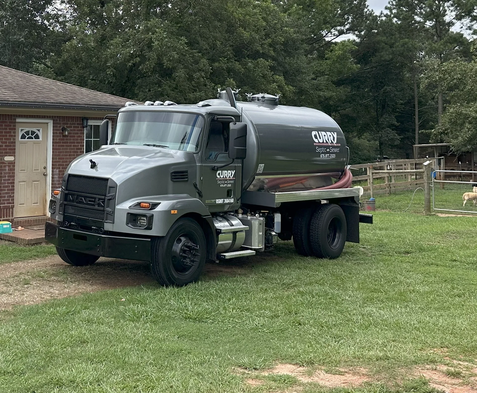 Curry Septic and Sewer crew at work in Hoschton, GA